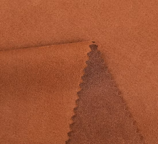 Tela de piel de imitación de tela de cuero de gamuza Tecido de una sola cara cepillada para prendas de vestir